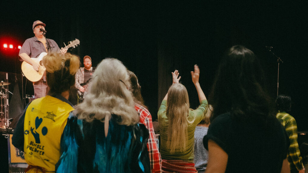 Crowd dancing in front of the stage at the Maple Sugar Festival, included if you buy Maple Sugar Festival tickets.