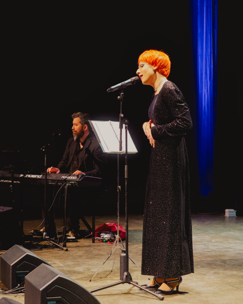 Locals artists Nico Rhodes and Joshua Holloway on stage.